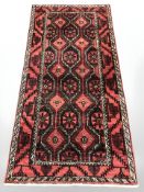 A Balouch rug, Afghanistan, 190 cm x 95 cm.