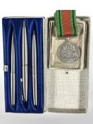 A World War II Defence Medal and a Parker fountain pen,