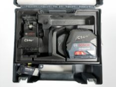 A Bosch Professional GCL 2-15 G self-levelling cross line laser level, boxed.