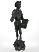 A cast iron figure of Don Quixote,