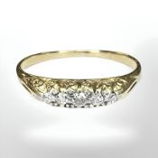 A five-stone diamond ring, marks rubbed, size P½ CONDITION REPORT: 2.
