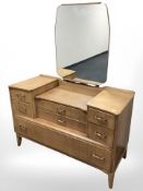A Lebus teak sunk centre mirror back dressing table, 108 cm x 47 cm x 142 cm.