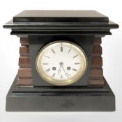 An Art Deco slate and marble eight day mantle clock, width 30 cm.