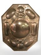 An embossed copper wall plaque, width 61 cm.