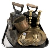 A group of 19th century irons, pair of brass candlesticks,