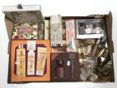 A collection of fragrances and cosmetic gift sets, various unboxed perfumes including Laura Ashley,