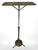 An industrial rise and fall metal table,