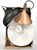 A group of Scandinavian pendant light fittings.