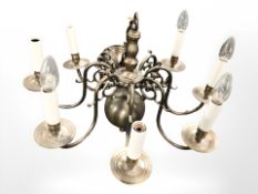 A brass chandelier, diameter 57 cm.