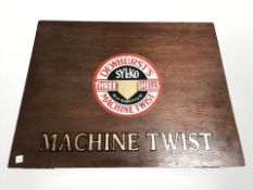 A mahogany box containing spools of thread with later Dewhurst's applied decoration.