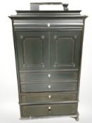 An early 20th century continental painted pine drinks cabinet fitted drawers beneath,