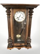 An early 20th century Junghans walnut cased wall clock