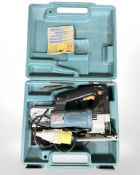 A Makita 4304T jigsaw, boxed.