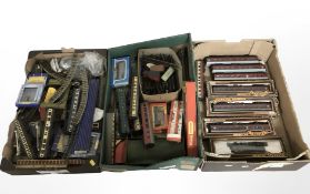 A quantity of Hornby and Palitoy OO gauge die cast rolling stock, track, scenery, etc.