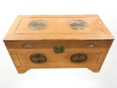 An oriental camphor wood blanket box,