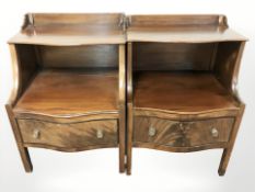 A pair of early 20th century mahogany serpentine front single drawer bedside stands,