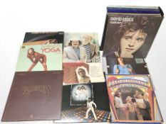 A case of vinyl LP records, including The Carpenters, Simon & Garfunkel, David Essex, James Taylor,