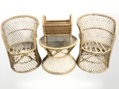 A pair of wicker armchairs,