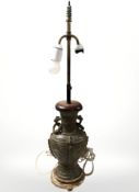 A Chinese style bronze twin handled lamp base, height 76 cm.