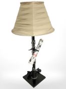 A 'clarinet' table lamp, height 82 cm.