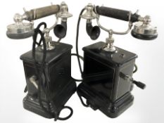 Two mid 20th century continental telephone handsets.