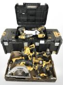 A collection of DeWalt power tools including DCS391 circular saw, cordless drills, jigsaw, etc.