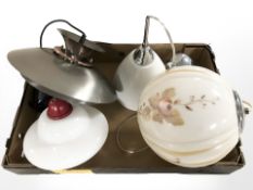 A group of Scandinavian pendant light fittings.