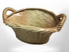 A Royal Worcester blush ivory porcelain basket, shape No. 2365, width 19 cm.