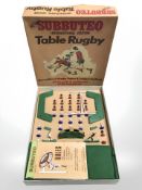 A Subbuteo international edition table rugby game.