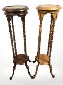 A pair of reproduction mahogany wig stands, height 100 cm.