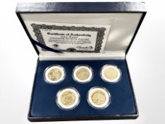 A Morgan Mint gold plated statehood quarter dollar collection, with certificate of authenticity.