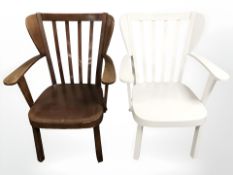 A pair of Fritz Hansen Canada chairs, one painted,