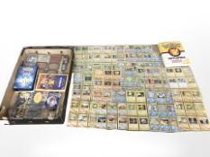 A large quantity of Pokemon cards, encyclopedia, DVDs.