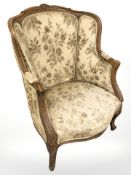 A continental carved beech salon armchair.