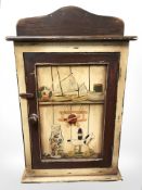 A continental painted single door cabinet with shelved interior, width 45 cm.