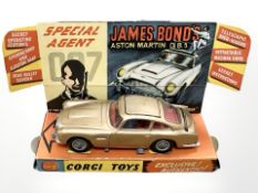 A Corgi Toys 261 James bond Aston Martin DB5 from Goldfinger, with Bond and baddie within,