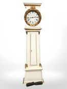 A 19th century continental painted and gilt longcase clock with pendulum and weights, height 191 cm.