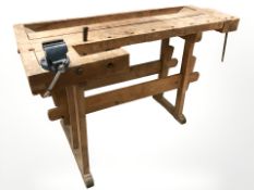 An early 20th century pine workbench, width 150 cm.