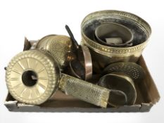 A group of brass and copper wares including planter, colander, long handled pan, etc.