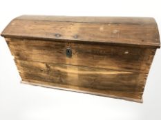 A 19th century oak dome top chest, 126 cm x 61 cm x 65 cm.