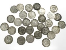 Thirty 0.500 silver one shillings, all 1920-1946. CONDITION REPORT: 167.