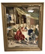 A gilt framed tapestry depicting Christ and the twelve disciples, overall 80 cm x 65 cm.