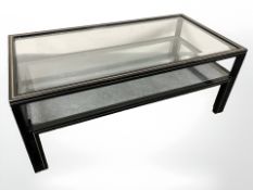 A French Pierre Vandel rectangular lacquered metal and glass two tier coffee table,