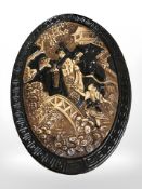 A Bretby oval wall plate depicting a geisha, length 37 cm.