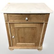 A 19th century pine and white marble topped wash stand, 62 cm x 42 cm x 78 cm.