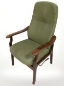A contemporary Danish adjustable armchair in green upholstery