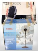 A body massage chair and an oscillating fan, both boxed.