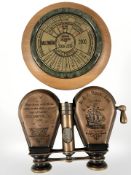 A pair of reproduction folding binoculars commemorating Columbus's landing in 1492,