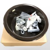 An enameled metal circular sink with fittings, diameter 45 cm.