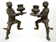 A pair of bronze figural monkey candlesticks, height 16cm.